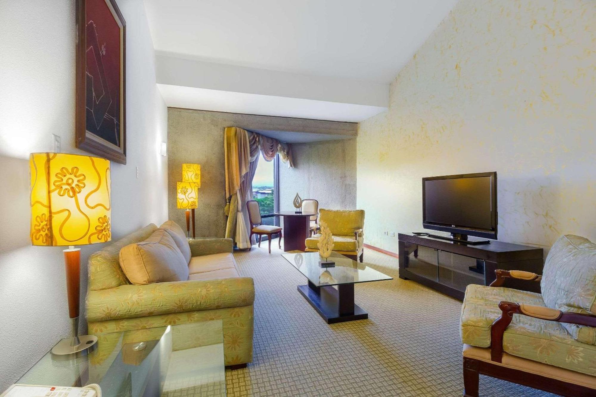 Radisson San Jose-Costa Rica Hotel Exterior photo A living room in a suite at the hotel